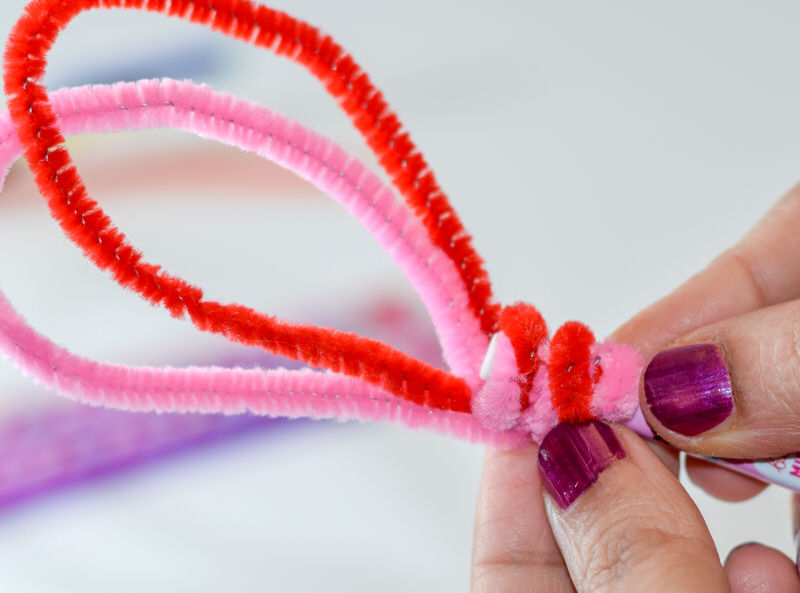 Twist the other end of the pipe cleaner and wrap around the pencil
